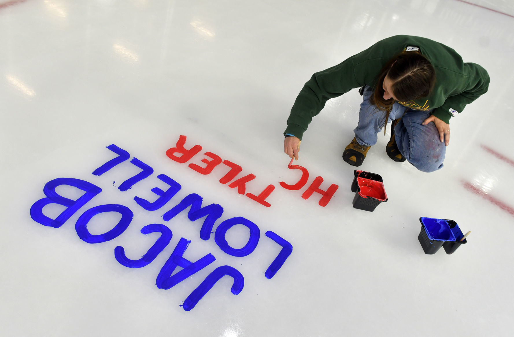 Salute To Military ice painting at the TaxSlayer Center